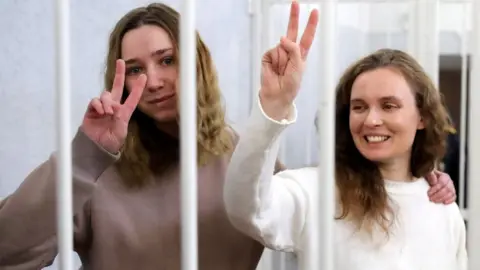 EPA Katerina Andreyeva (R) and Daria Chultsova in court, 18 Feb 21