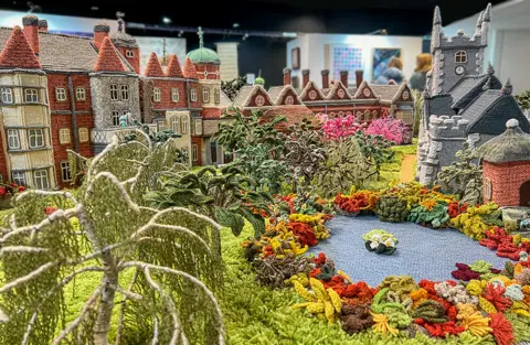 Martin Barber/BBC Knitted replica of Sandringham House and gardens