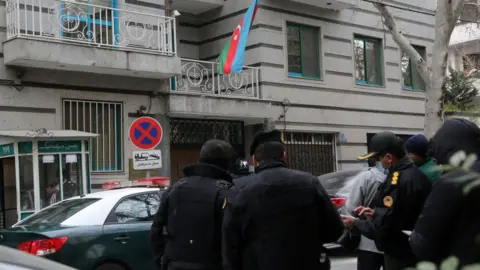 Anadolu Agency Police take security measurements after one person was killed in an attack using an automatic weapon on Azerbaijan's Embassy in Iran's capital Tehran, on January 27, 2023. Head of embassy's security service killed, says Azerbaijan's Foreign Ministry, while state media says suspect in attack was detained.