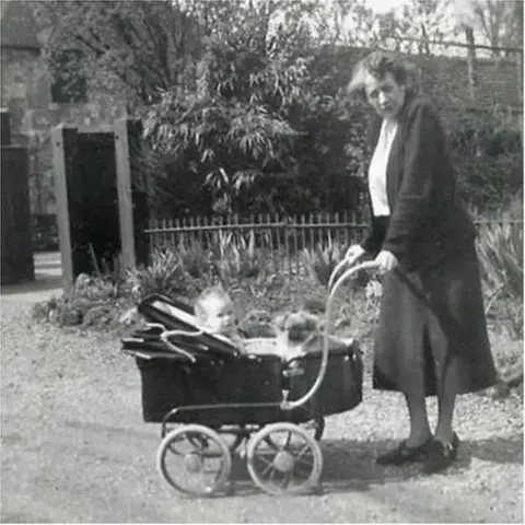 Ann Searight Black and white photo of Ms Brooke with her granddaughter Ann in a pram
