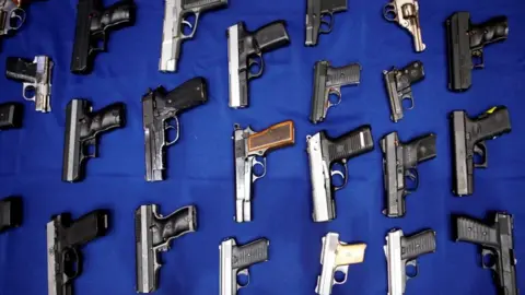Reuters Seized handguns, file image
