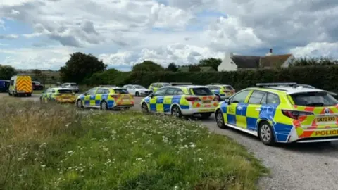 Police cars at the scene