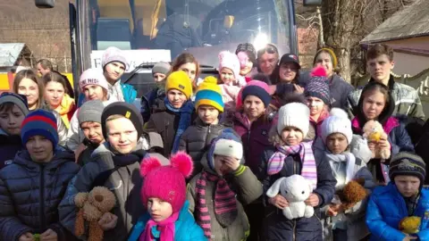 Submitted image A group of Ukrainian children arrive safely in Mukachevo