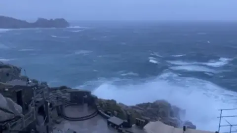 The Minack Theatre The Minack Theatre being hit by large waves