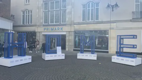 BBC A sculpture spelling out the word Home