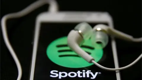 Reuters Spotify on a phone