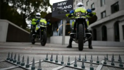 PA Met Police spikes