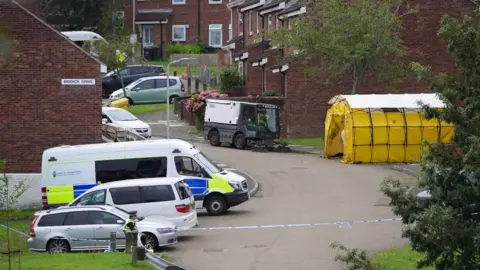 PA Media Scene of the Keyham tragedy