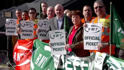 PA Media RMT general secretary, Mick Lynch, on a picket line outside outside Euston station in London on 25 June