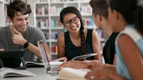 Getty Images College students working on a project generic