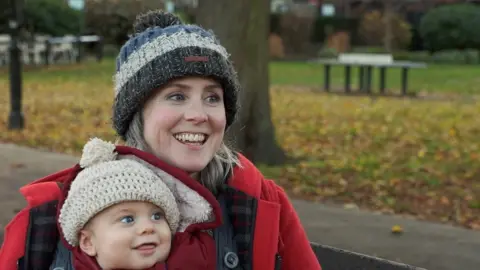 Steve Huntley/BBC Elisabeth Whitebread and the child she's holding in the pic is nine-month-old Toby