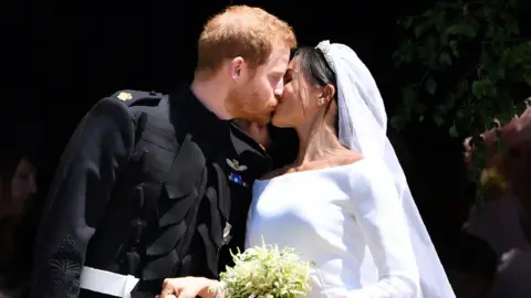 PA Media Harry and Meghan on their wedding day