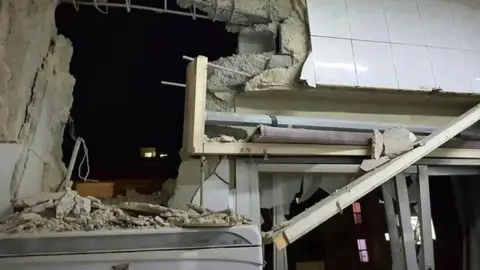 AFP/Getty Images A photo released by Syria's Sana news agency apparently showing a destroyed house west of Damascus, Syria. Photo: 20 November 2019