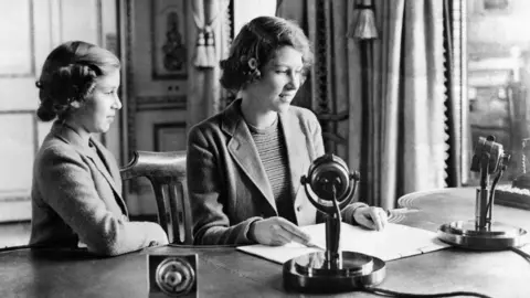 PA Wire The then Princess Elizabeth and Princess Margaret after they broadcast on Children's Hour from Windsor Castle