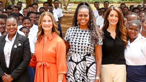 Melinda French Gates, Michelle Obama and Amal Clooney with teachers and pupils of Ludzi School