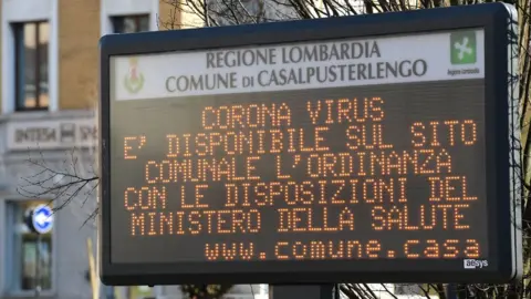 An Italian municipal information sign urging residents to read Ministry of Health advice regarding coronavirus