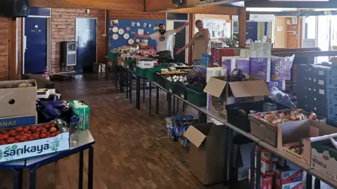 Spires Foodbank  Workers with food