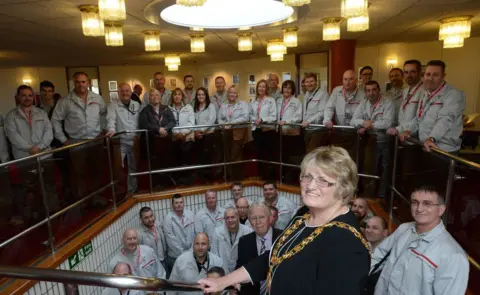 Craig Connor / NNP Deputy Leader Sunderland City Council Harry Trueman and Mayor of Sunderland Cllr Doris McKnight with some of Nissan's Sunderland workforce