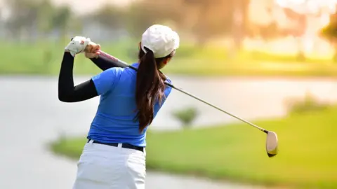 Getty Images Female golfer