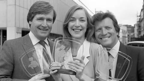 PA Media William Roache with co-stars Anne Kirkbride and Johnny Briggs in 1983