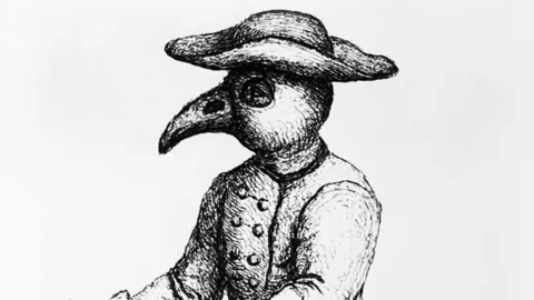 Getty Images Plague doctor wearing birdish outfit