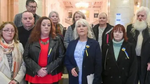 PACEMAKER Margaret McGuckin from the group SAVIA pictured with survivors of abuse who went to Stormont on Friday