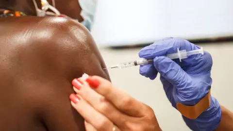 Getty Images US woman being vaccinated