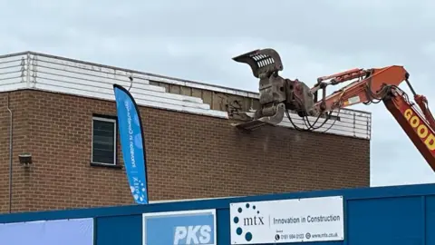 Qays Najm/BBC Demolition work starting on the Queen Elizabeth Hospital's Inspire Centre in King's Lynn, Norfolk