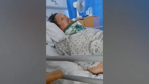 Family handout Andrew Giles in hospital