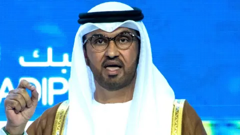 Getty Images Sultan al-Jaber, speaking at the Abu Dhabi International Petroleum Exhibition in October 2023