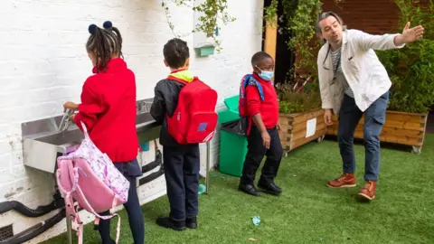 Dominic Lipinski hand washing in school