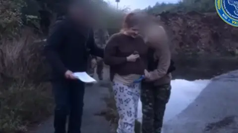 Ukrainian government She can be seen, looking heavily pregnant, in a video of the exchange released by Ukrainian authorities.