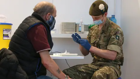 Getty Images Army vaccinators