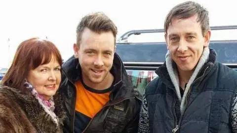 Family handout Susan Gale, left, Matthew and James