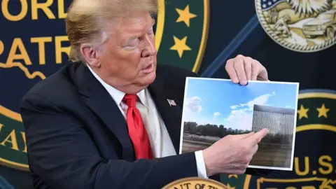 Getty Images Trump and an image of the bollard barrier