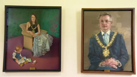 Portraits of the Alliance Party's Nuala McAllister and the DUP's Brian Kingston