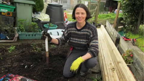 Tamasin Pemberton Tamasin Pemberton with spade and soil