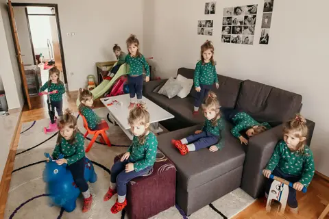 Igor Isanović / Unicef A multiple exposure image of the same child doing different activities at home