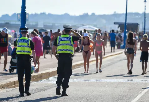 Getty Images Picture of police on the beach