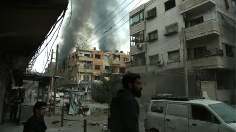 AFP/Getty Shelling in Douma