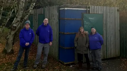Meriden Adventure Playground Some of the workers at Meriden Adventure Playground stand outside the storage unit in which toys and clothing was stolen