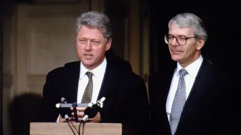 Getty Images John Major pictured with Bill Clinton during his 1994 visit to England