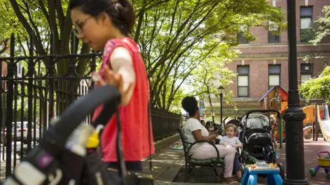 Getty Images nannies in a park