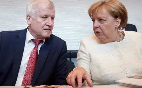 EPA Horst Seehofer with German Chancellor Angela Merkel, 12 Jun 18