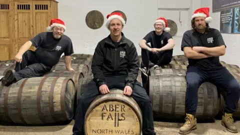 Aber Falls Whisky Distillery Aber Falls team celebrate filling cask 3,000 at Christmas