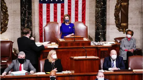 Getty Images Nancy Pelosi after the house was reconvened