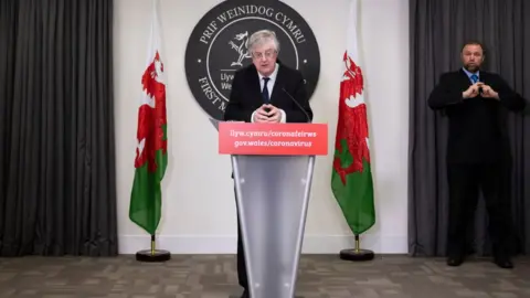 Getty Images Mark Drakeford at a press conference