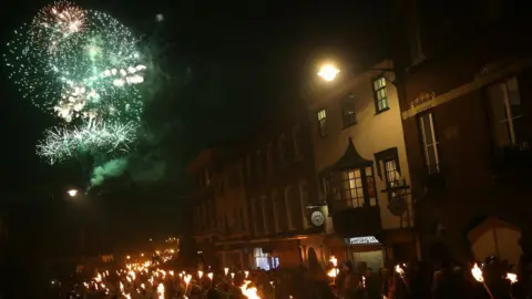 DANIEL LEAL-OLIVAS/AFP/GETTY IMAGES Fireworks over Lewes as a torchlight parade marches the streets