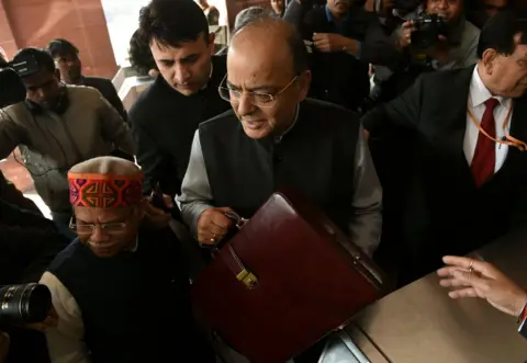 AFP/Getty Images Indian finance minister Arun Jaitley arrives at Parliament House to present the budget