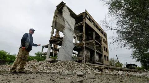 Reuters A building destroyed on a poultry farm in Luhansk region